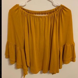 Loose off the shoulder blouse.